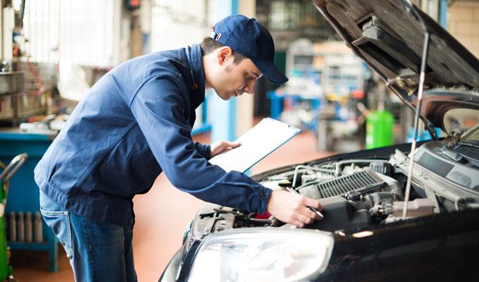 Mechanic working CAA Appoved Auto Repair Services
