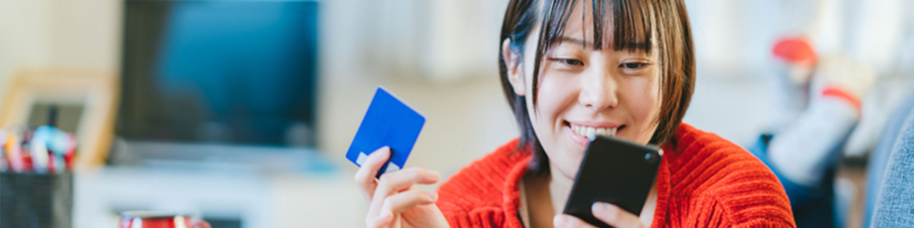 Woman shopping online for CAA Rewards