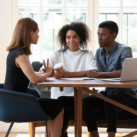 Insurance Advisor discussing options with clients