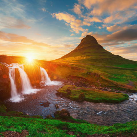 Colorful sunrise on Kirkjufellsfoss waterfall.