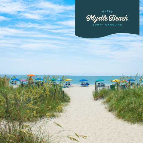 View of lawn chairs on the beach at Myrtle Beach