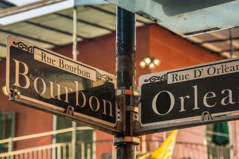 Street sign of Rue Bourbon in New Orleans