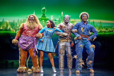 The Wiz cast as the cowardly lion, Dorothy, Tin man, and scarecrow