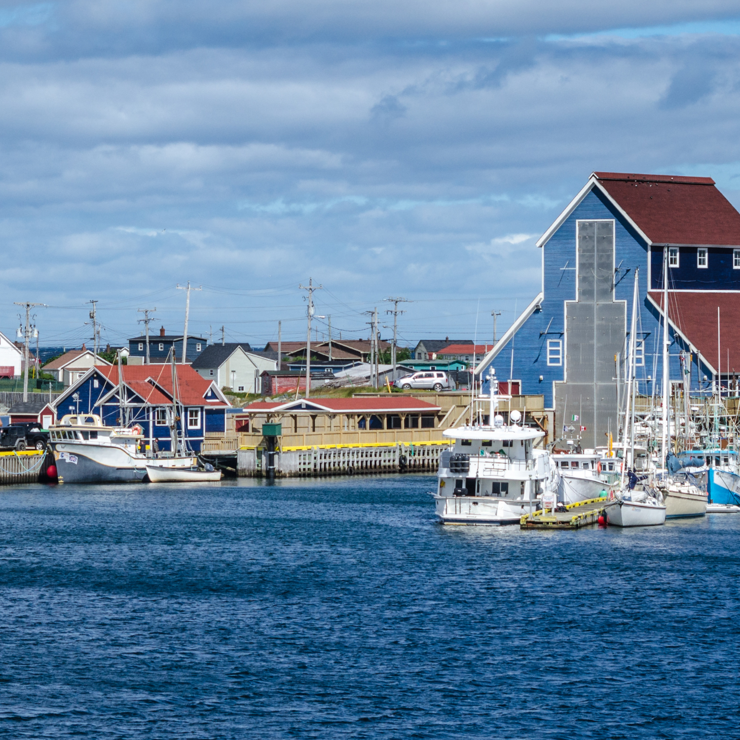 Fishing boats at docks in the villages' harbours in Bonavista, Newfoundland, Canada.