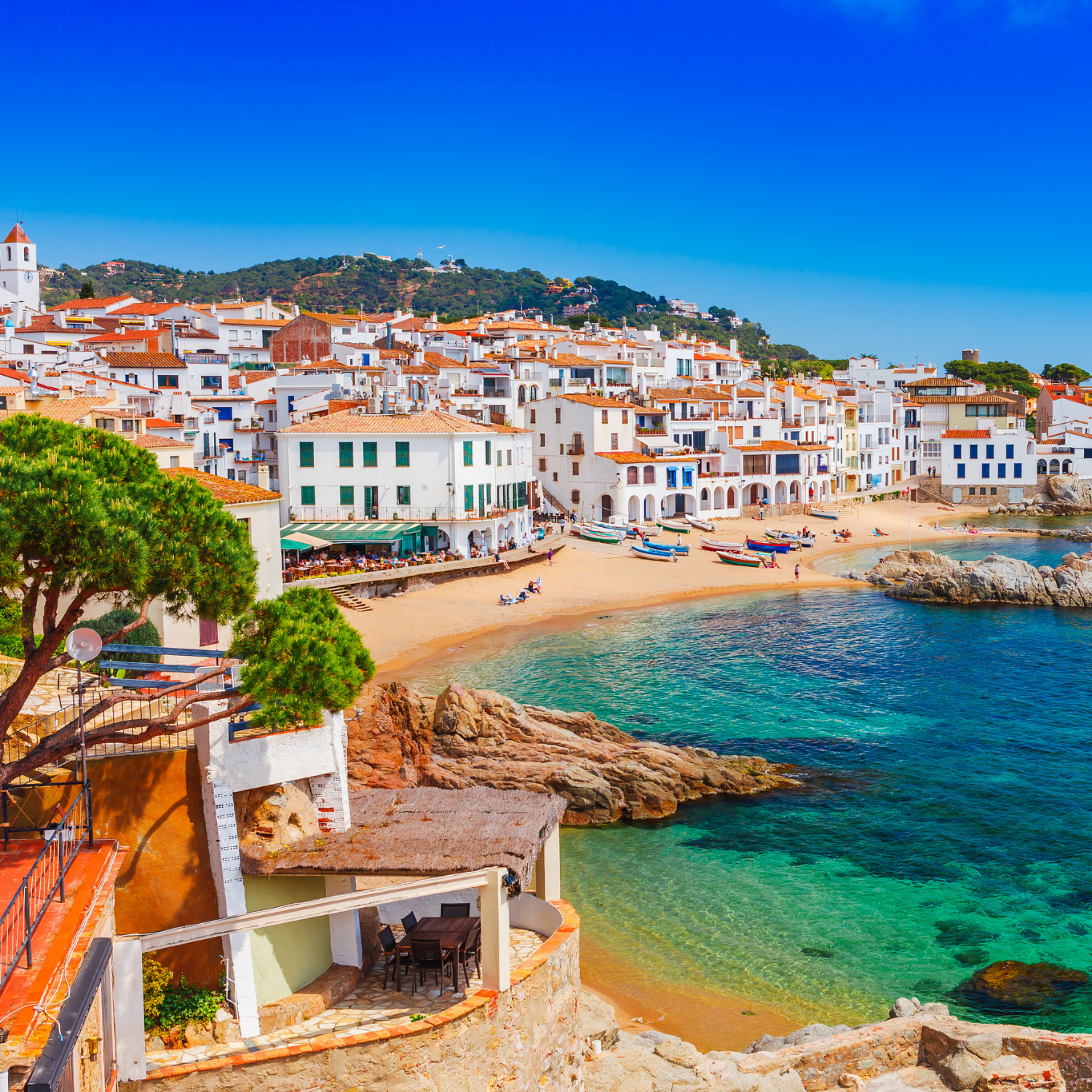 Sea landscape with Calella de Palafrugell, Catalonia, Spain near of Barcelona. Scenic fisherman village with nice sand beach and clear blue water in nice bay. Famous tourist destination in Costa Brava
