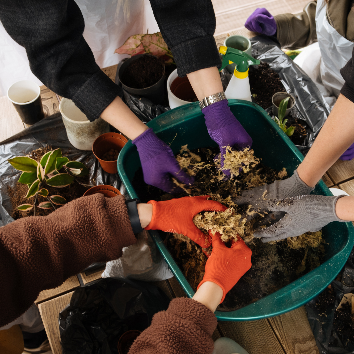 group of people making planters together