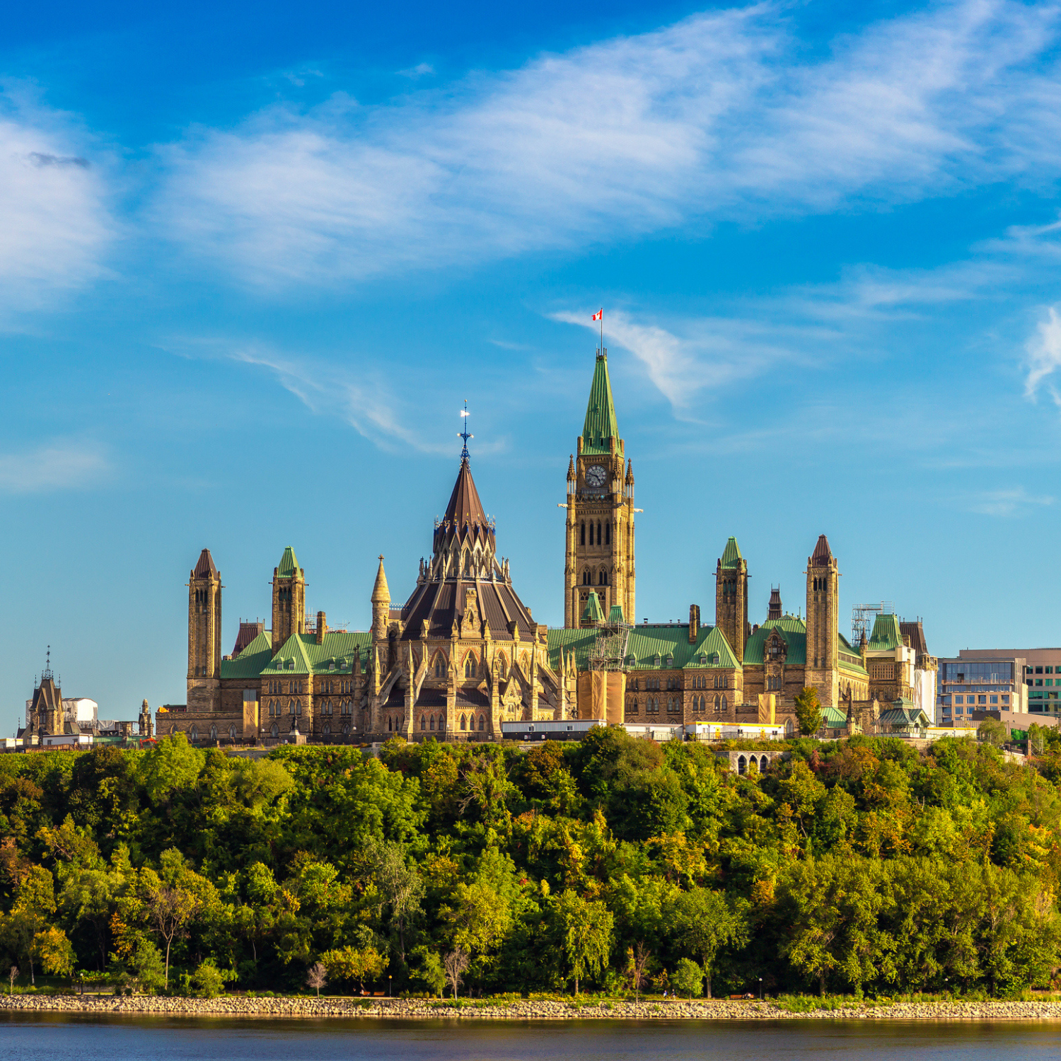 Panorama of Canadian Parliament in Ottawa and river in a sunny day, Canada