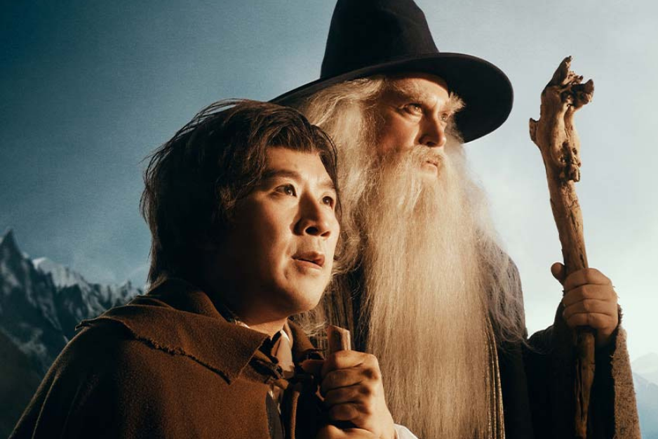 Bilbo and Gandalf looking into the distance