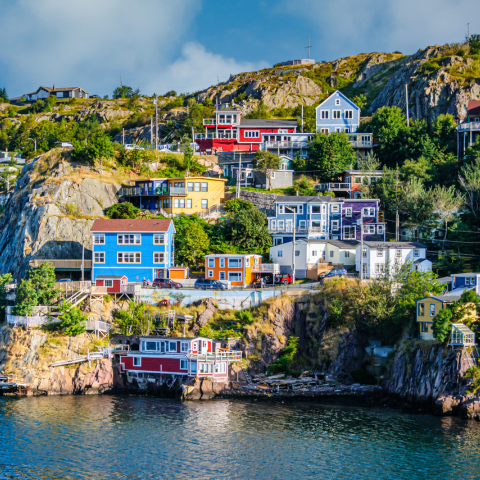 colorful homes on the rocky hillside of The Narrows, an inlet entering St. John's Harbor