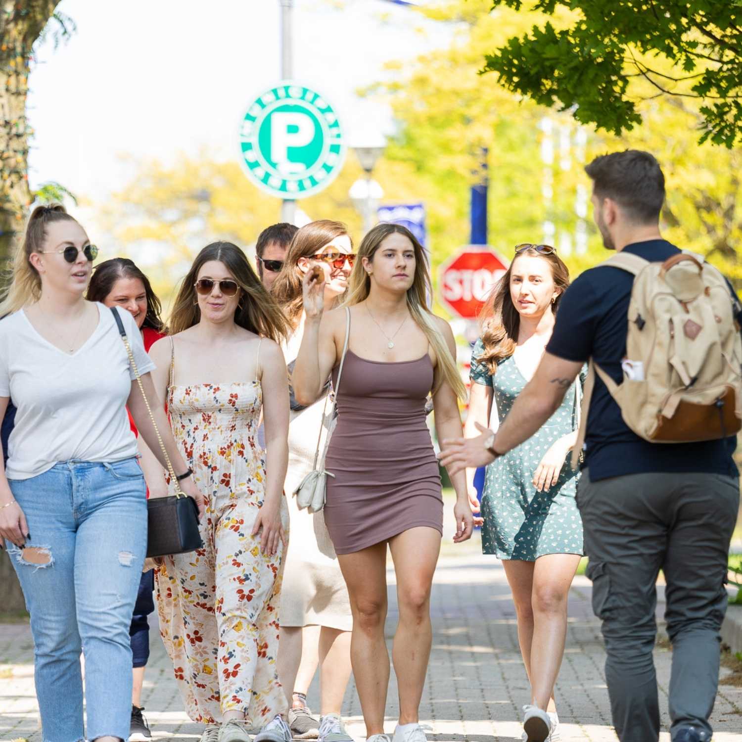 group of young adults on walking tour