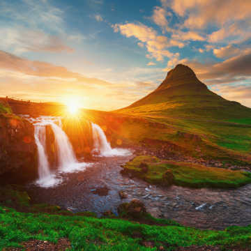 Colorful sunrise on Kirkjufellsfoss waterfall.