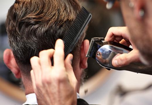 Man getting hair cut