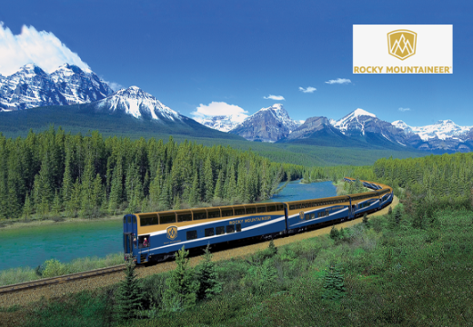 rocky mountaineer train with river, trees and mountain landscape