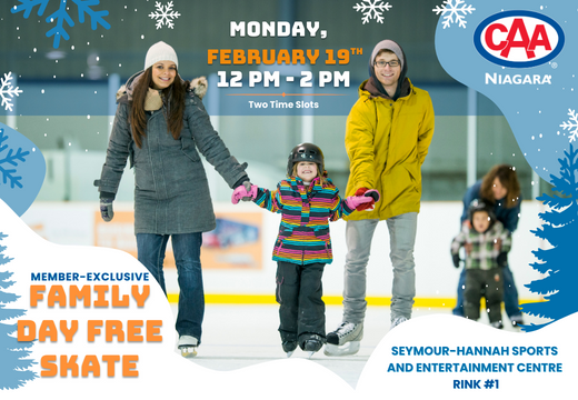 A family holding hands while ice skating together