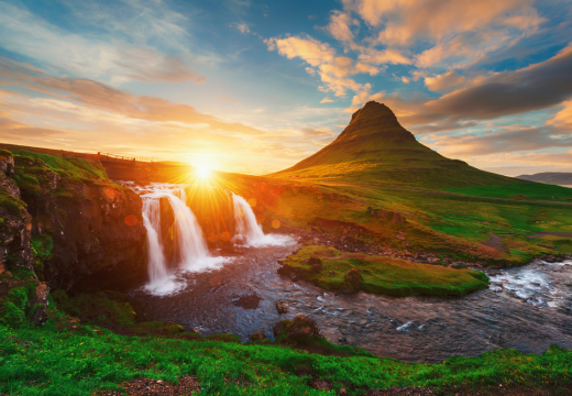 Colorful sunrise on Kirkjufellsfoss waterfall.