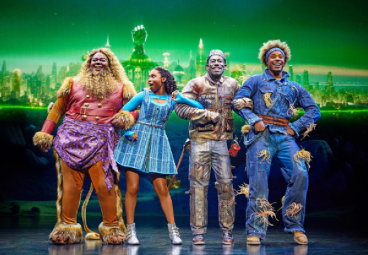 The Wiz cast as the cowardly lion, Dorothy, Tin man, and scarecrow