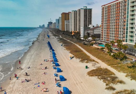 Aerial view of Myrtle Beach, South Carolina. Buildings and beach at sunset.