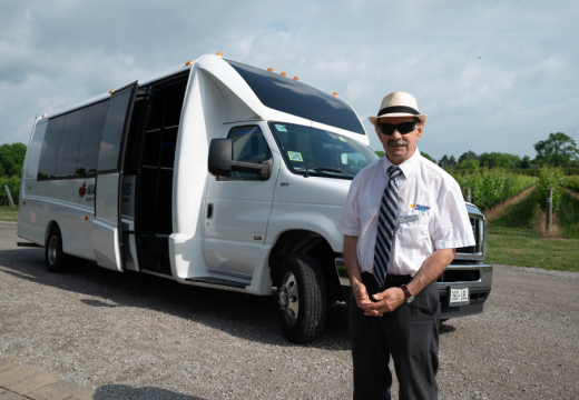 Niagara Airbus coach bus with driver standing infront