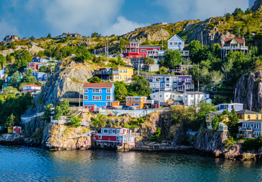 colorful homes on the rocky hillside of The Narrows, an inlet entering St. John's Harbor