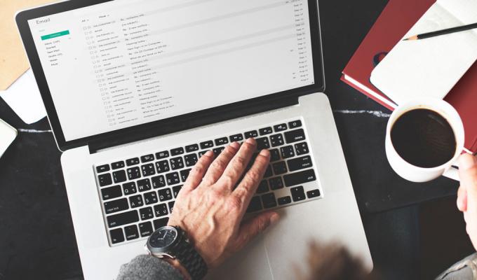 Person checking email on computer