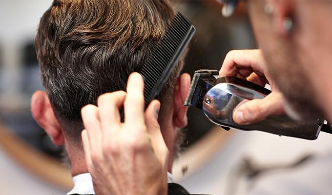 Man getting hair cut