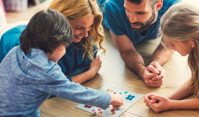 Family playing board games