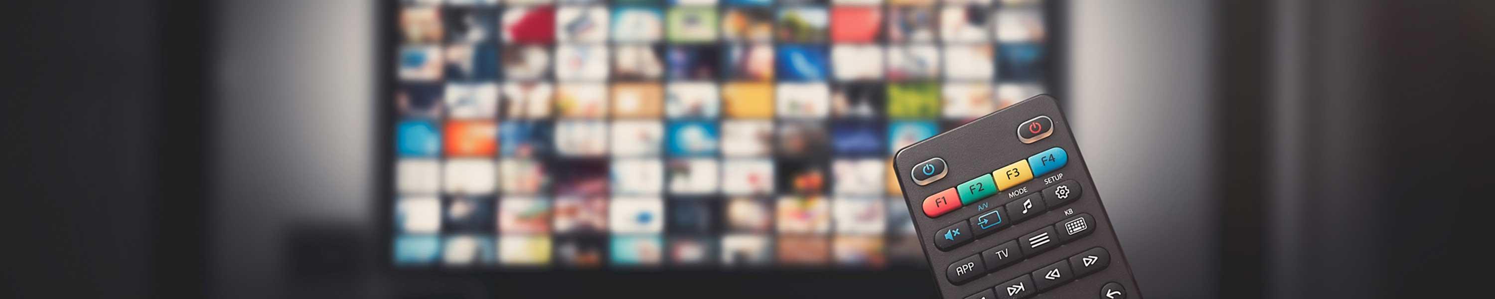 Remote pointed at TV movie selection