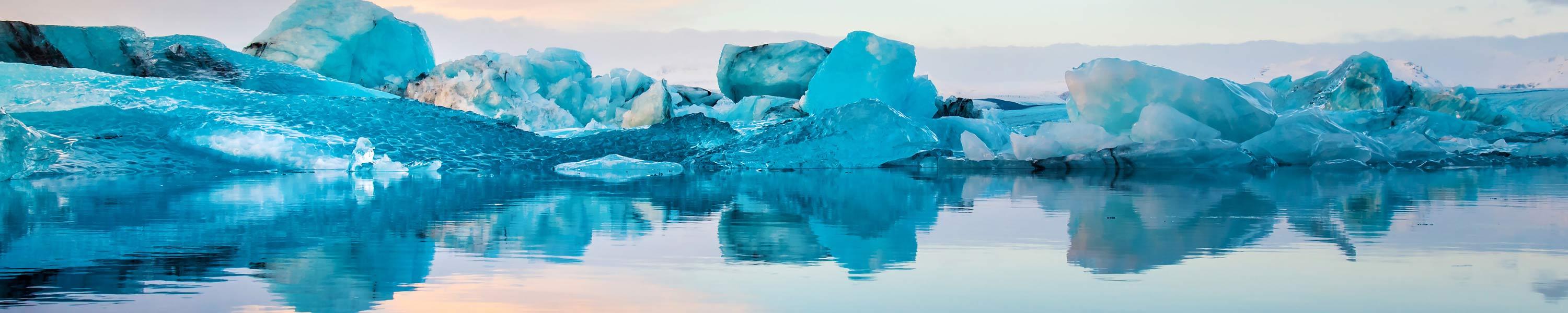 Jokulsarlon Glacier Lagoon in Iceland at sunset ice reflected on the glacial calm water