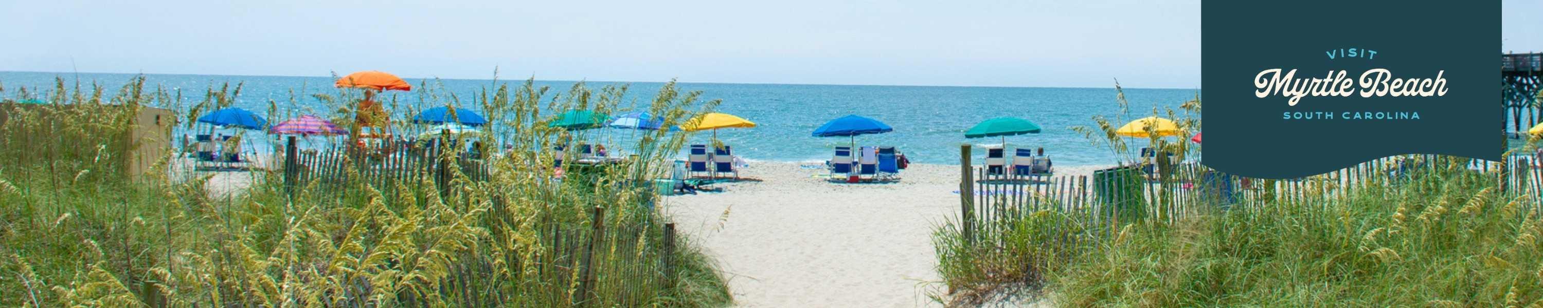 View of lawn chairs on the beach at Myrtle Beach