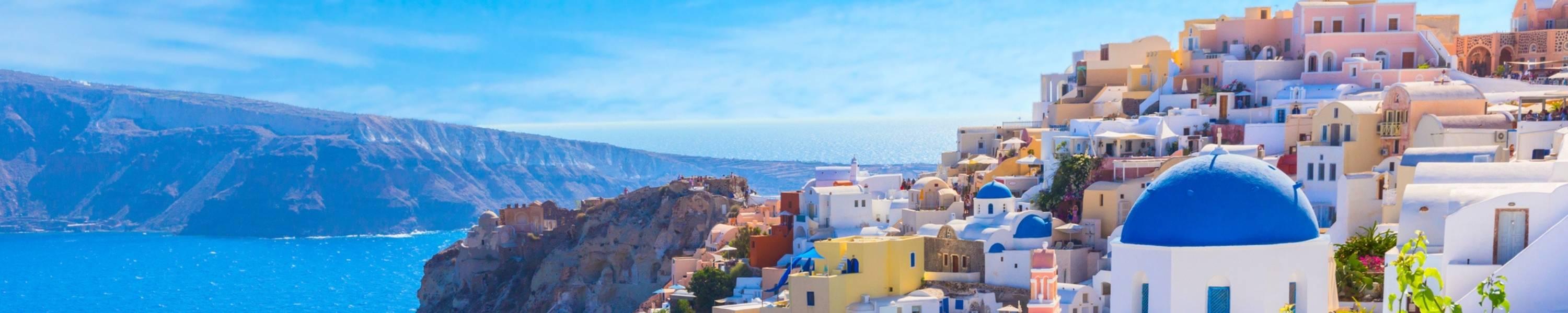 Aerial view of Greece on mountaintop with ocean in distance