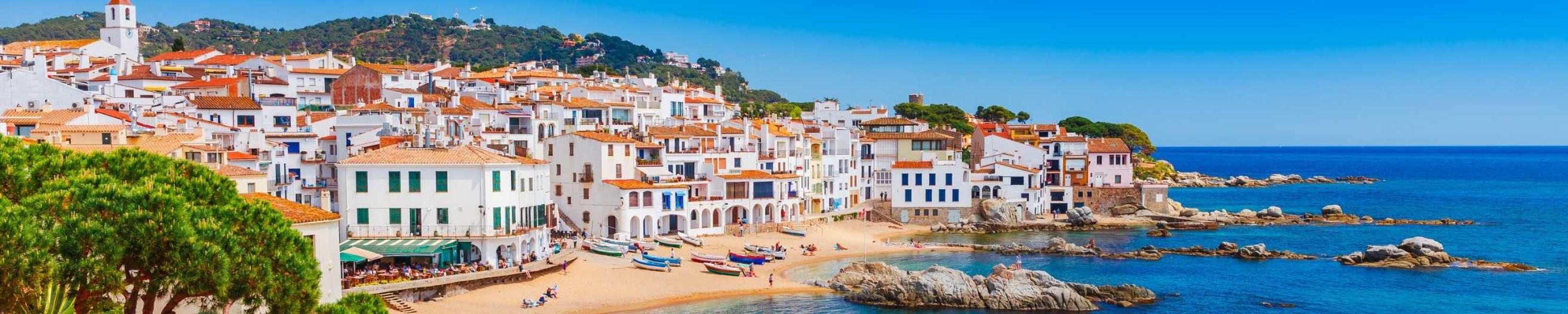 Sea landscape with Calella de Palafrugell, Catalonia, Spain near of Barcelona. Scenic fisherman village with nice sand beach and clear blue water in nice bay. Famous tourist destination in Costa Brava