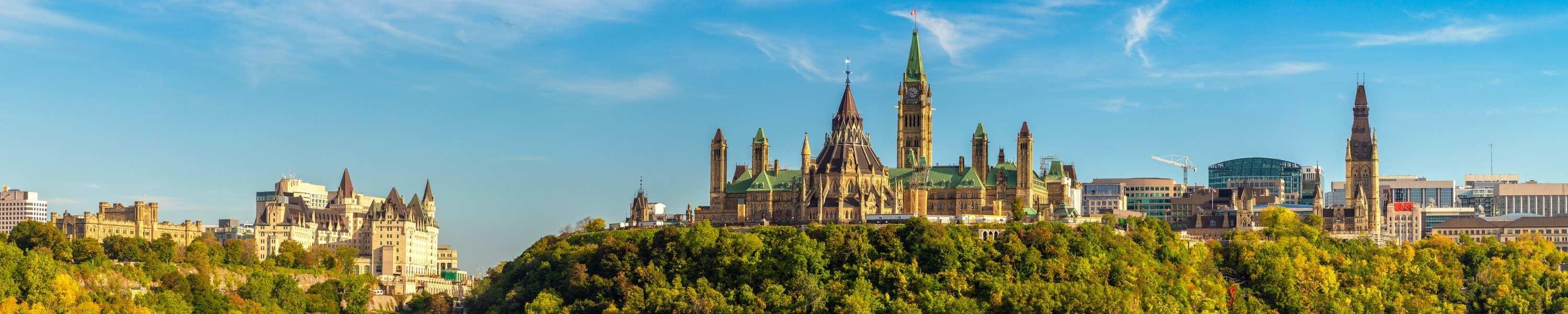 Panorama of Canadian Parliament in Ottawa and river in a sunny day, Canada