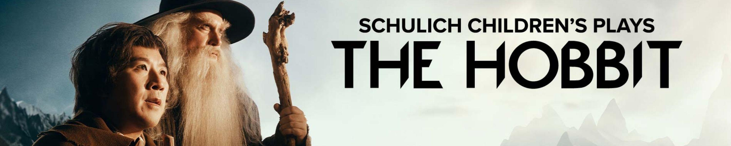 The Hobbit Title with Bilbo and Gandalf looking into the distance