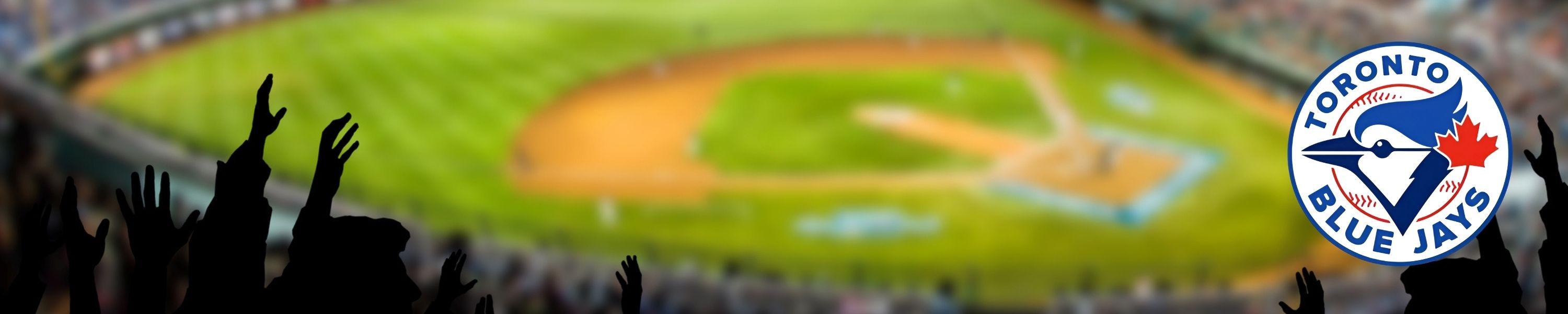 baseball field with crowd and toronto blue jays logo