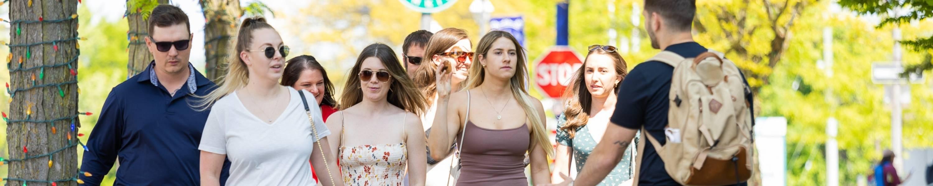 group of young adults on walking tour