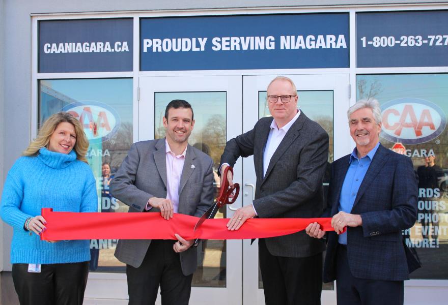 Michelle Schleimer, General Manager, BentallGreenOak; Mat Siscoe, Mayor of St. Catharines; Peter Van Hezewyk, President and CEO, CAA Niagara; and Michael Goodale, Chair of CAA Niagara’s Board of Directors at the ribbon cutting in front of CAA Niagara’s new Pen Centre Branch 