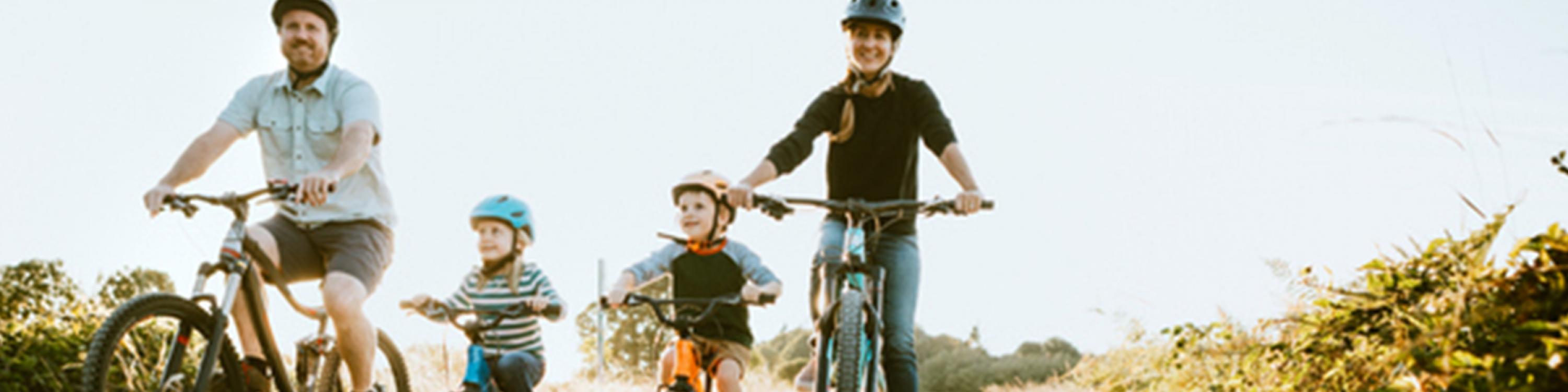 Young family riding bikes
